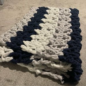 80 by 60 hand knotted chunky blanket.